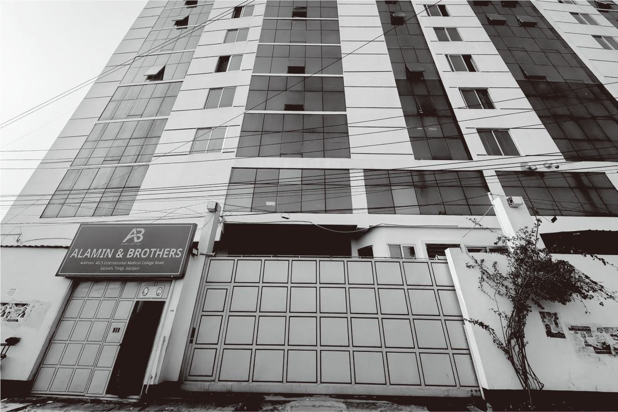 Alamin and Brothers factory building exterior with signage